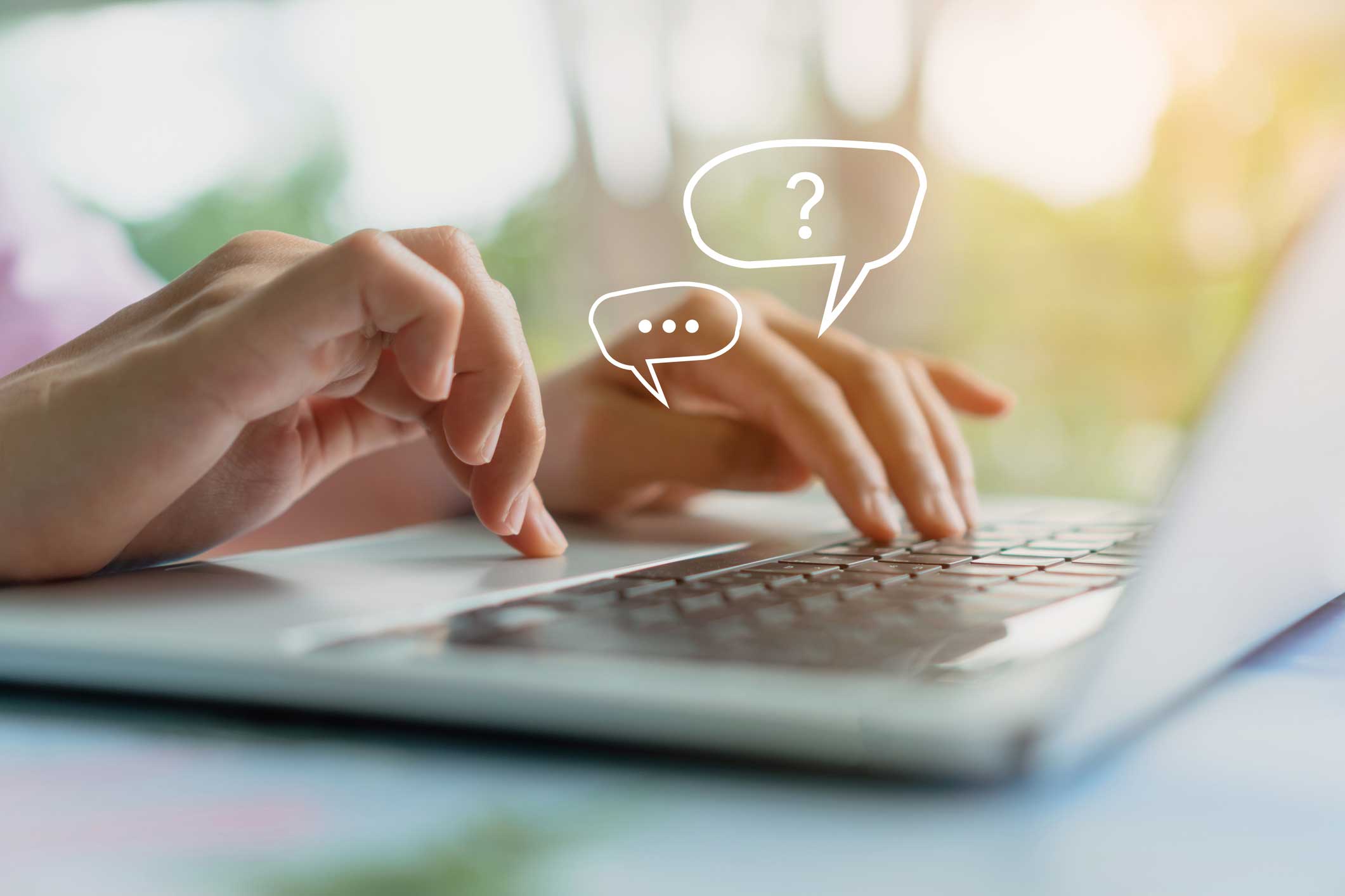 Person typing on a keyboard